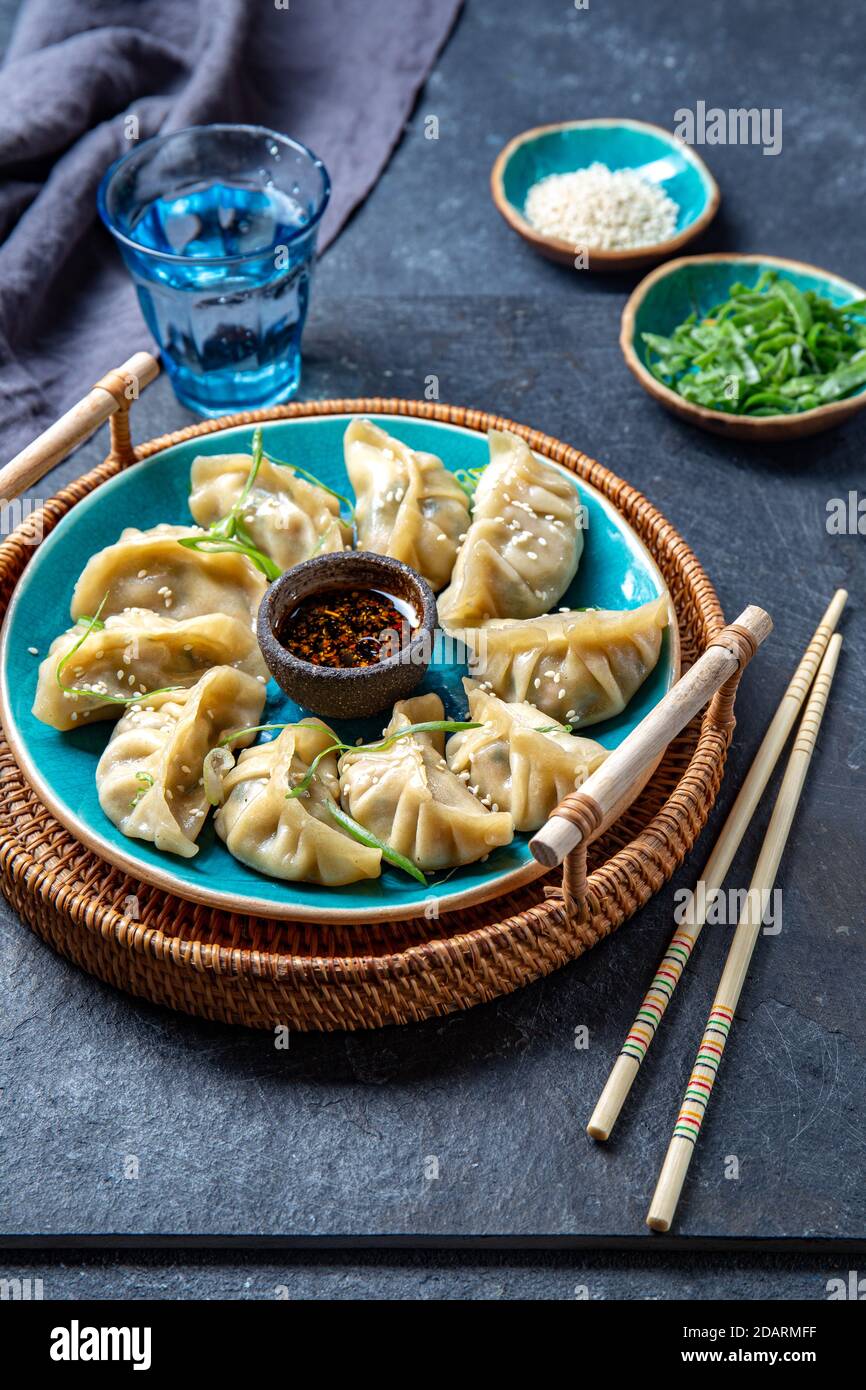 Asian Potstickers dumplings Gyoza with Soy Sauce Stock Photo