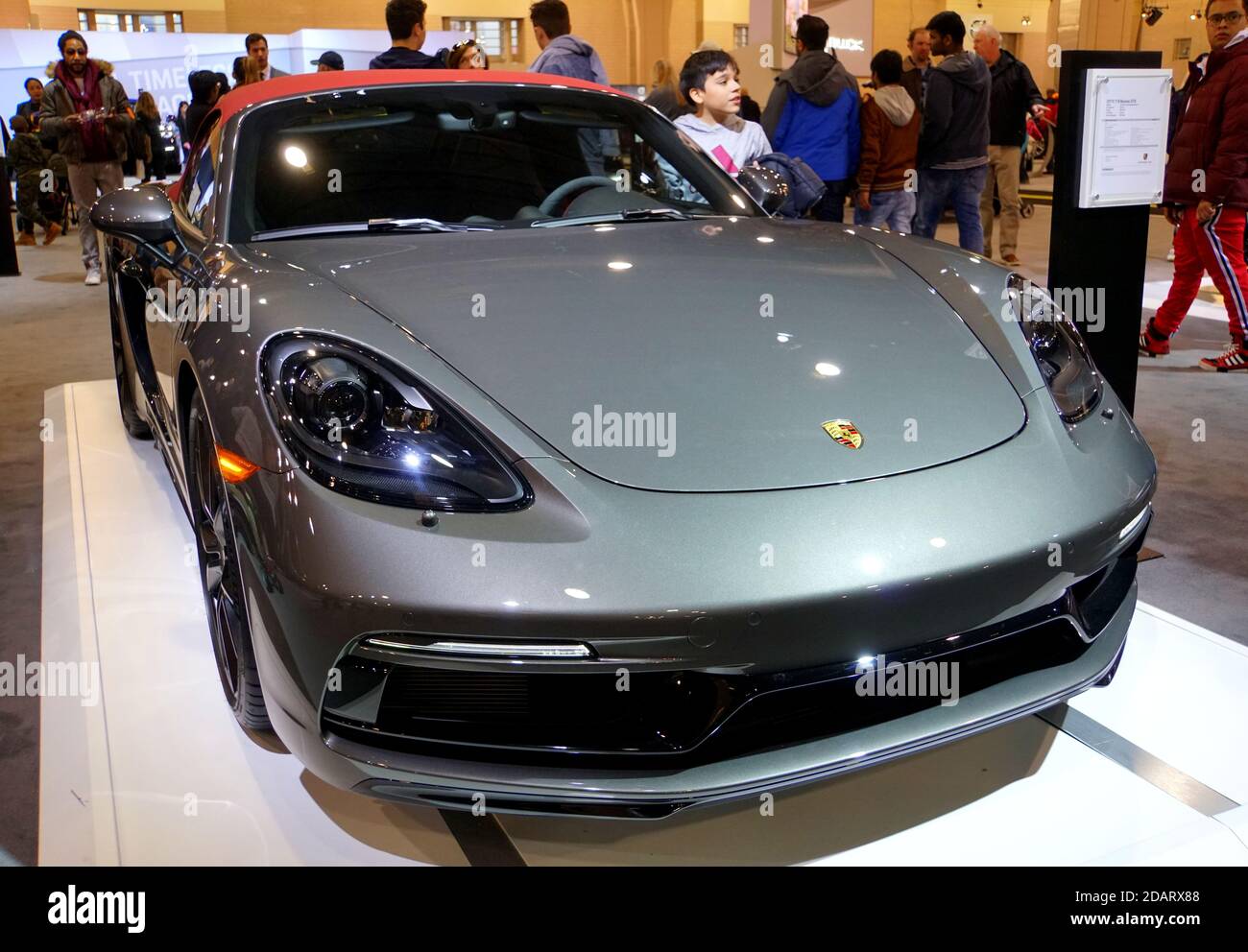 Philadelphia, Pennsylvania, U.S.A - February 9, 2019 - The front view of a grey 2019 Porsche 718 Boxster GTS convertible sports car with red top Stock Photo