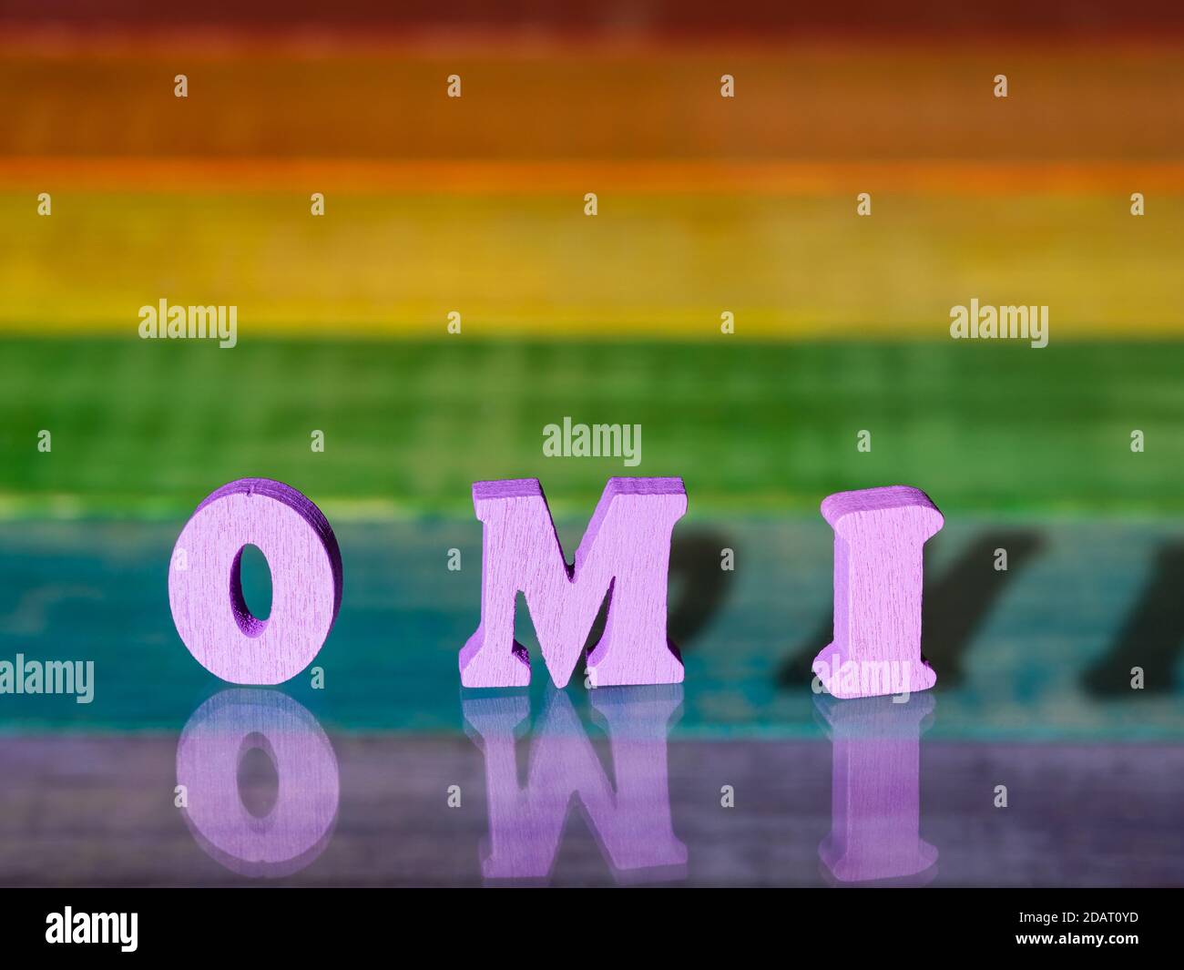 inscription omi on background of lgbt flag  Stock Photo