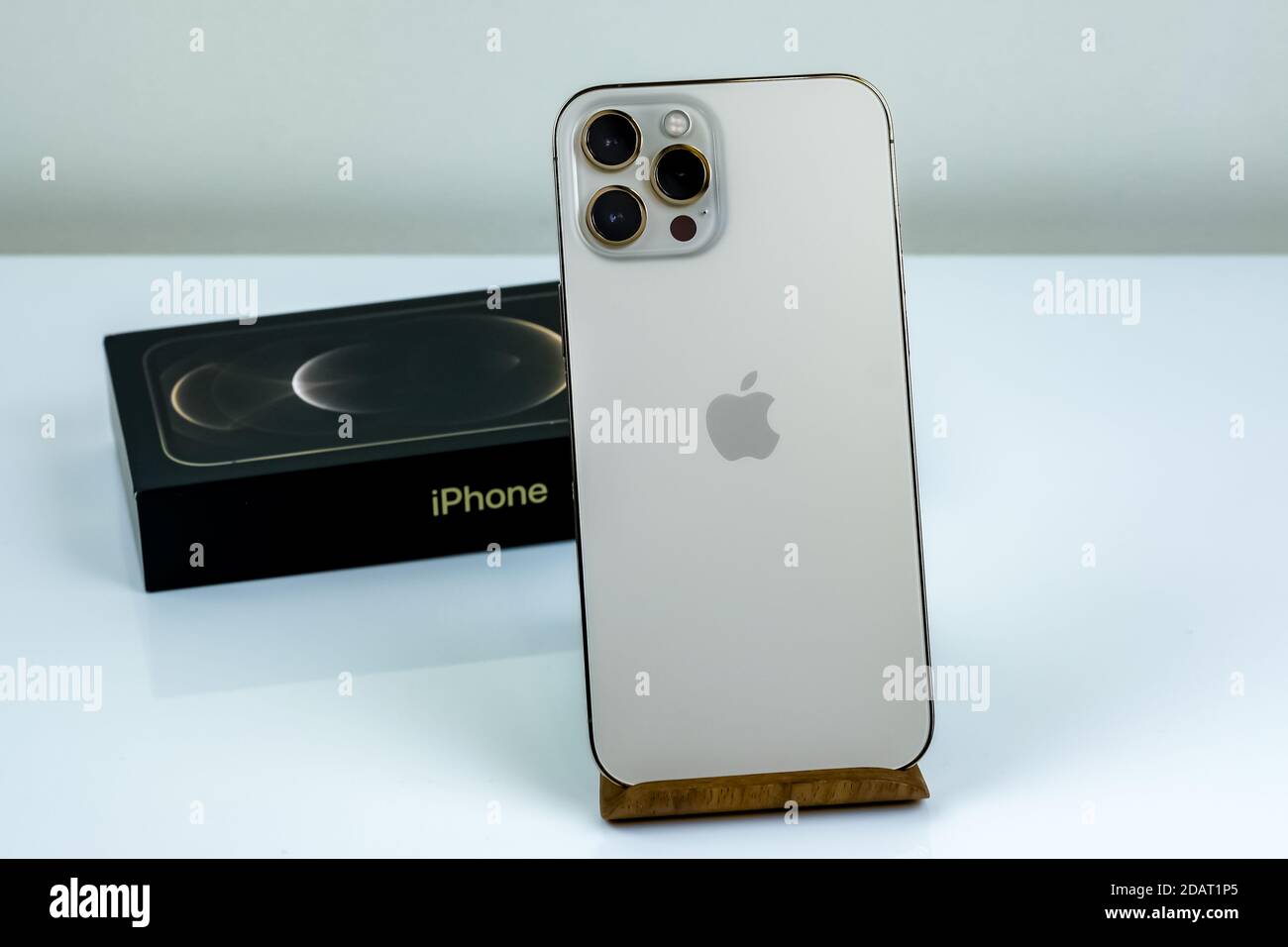 Iphone 12 Pro Max In Gold Next To Its Box Stock Photo Alamy