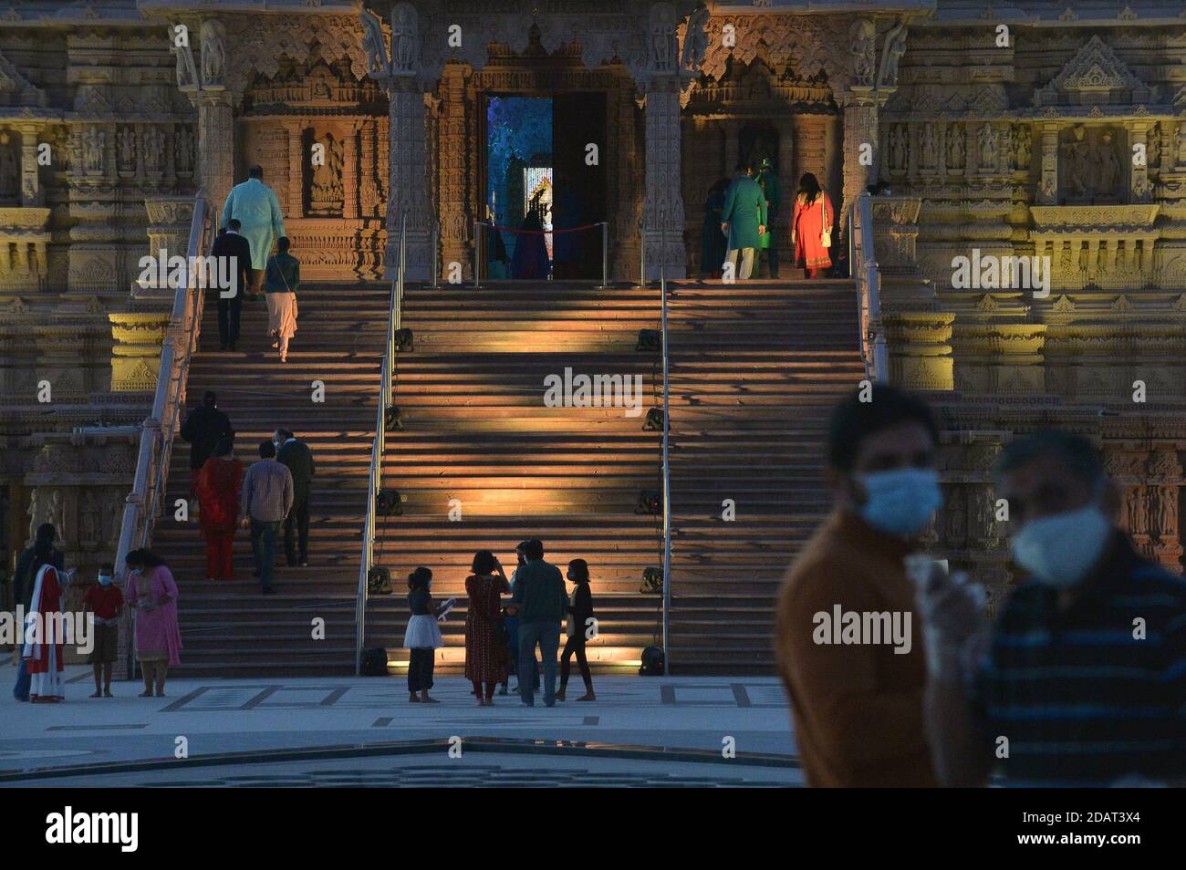 Chino Hills, United States. 15th Nov, 2020. Worshipers gather at the BAPS Swaminarayan Mandir, a large Hindu Temple to mark Diwali, the festival of lights celebrated by a billion people worldwide in Chino Hills, California on Saturday, November 14, 2020. Diwali, the Indian festival of light celebrates the defeat of ignorance through knowledge. Vice president-elect Kamala Harris, set to be the first South Asian American VP tweeted out wishes for a Happy Diwali. Photo by Jim Ruymen/UPI Credit: UPI/Alamy Live News Stock Photo