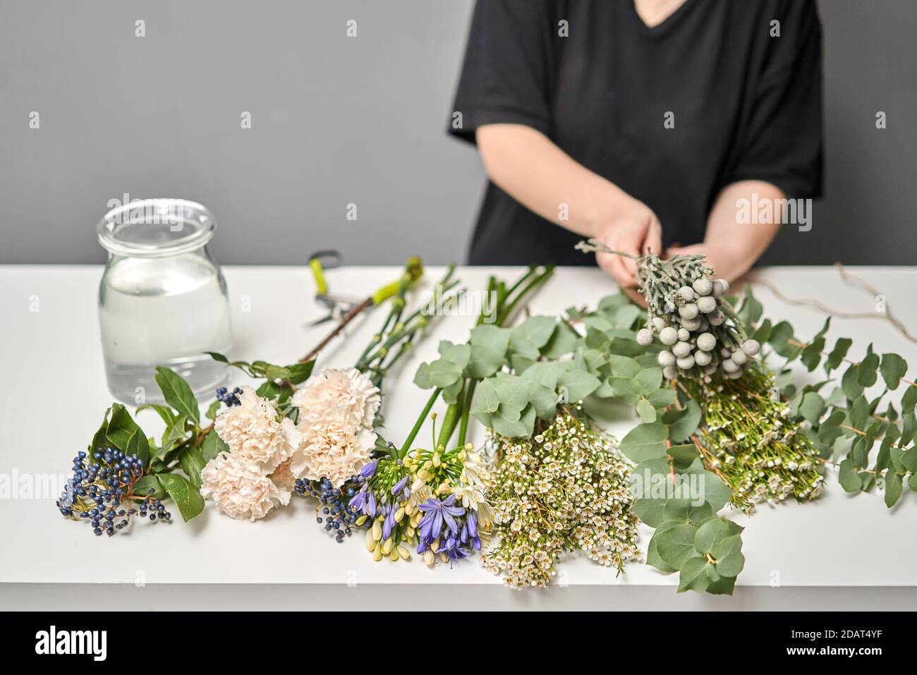 Bouquet 009, step by step installation of flowers in a vase. Flowers bunch, set for home. Fresh cut flowers for decoration home. European floral shop Stock Photo