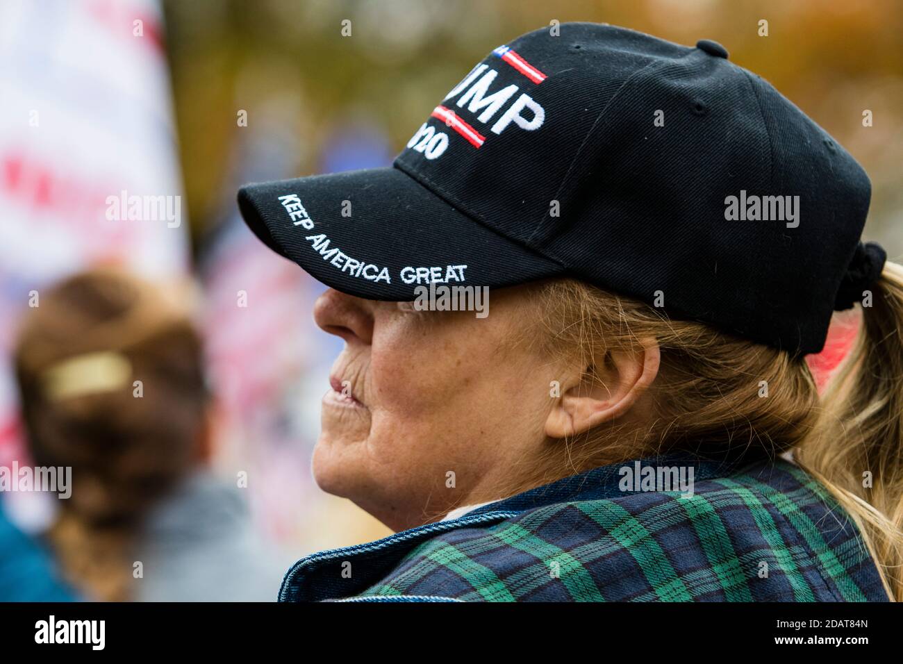 Carson, United States. 14th Nov, 2020. Woman wearing a Trump hat takes part during the rally.Pro Trump supporters take part in the 'Million MAGA March' at the state capital building. They were protesting what they see as the election being stolen by fraud. Credit: SOPA Images Limited/Alamy Live News Stock Photo