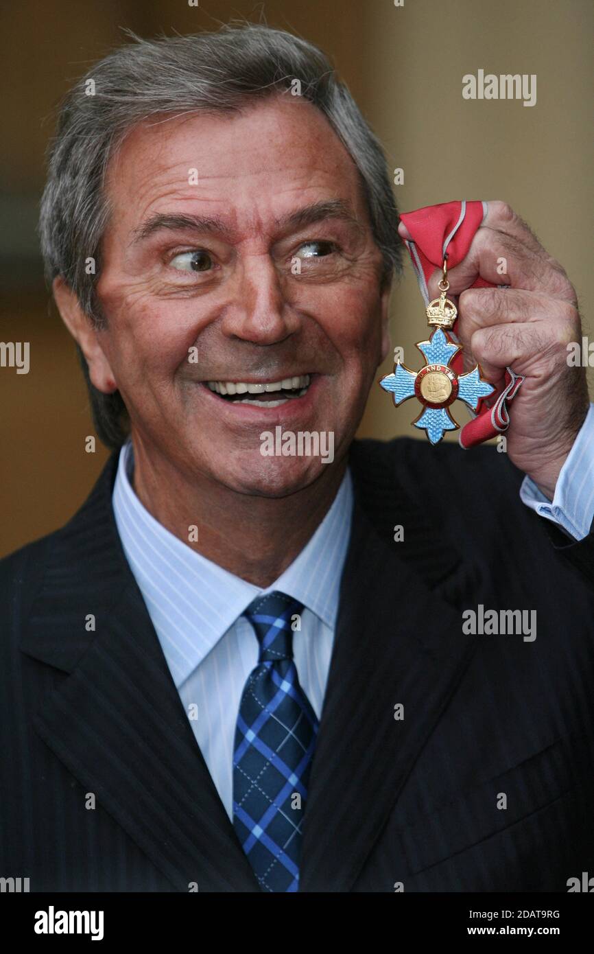 File photo dated 02/12/08 of veteran entertainer Des O'Connor with his CBE at Buckingham Palace, London, who sadly passed away on Saturday 14 November aged 88. His agent confirmed he had been admitted to hospital just over a week ago, following a fall at his home in Buckinghamshire. Unfortunately yesterday evening his condition suddenly deteriorated and he drifted peacefully away in his sleep. Stock Photo