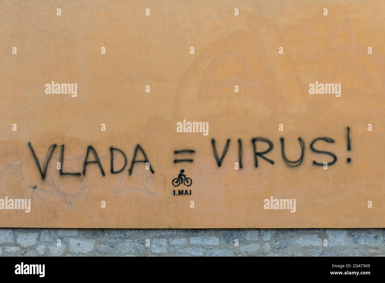 Anti-government graffiti in Ljubljana, Slovenia. Vlada = virus, Government = Virus Stock Photo