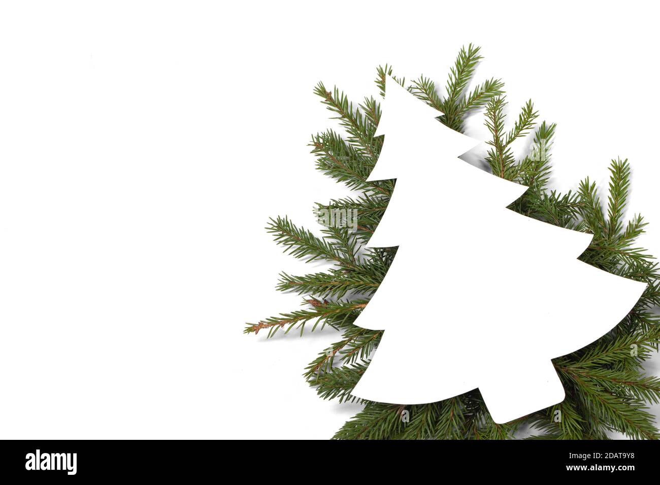 Christmas white fir tree shaped blank card with copy space and decor of ...