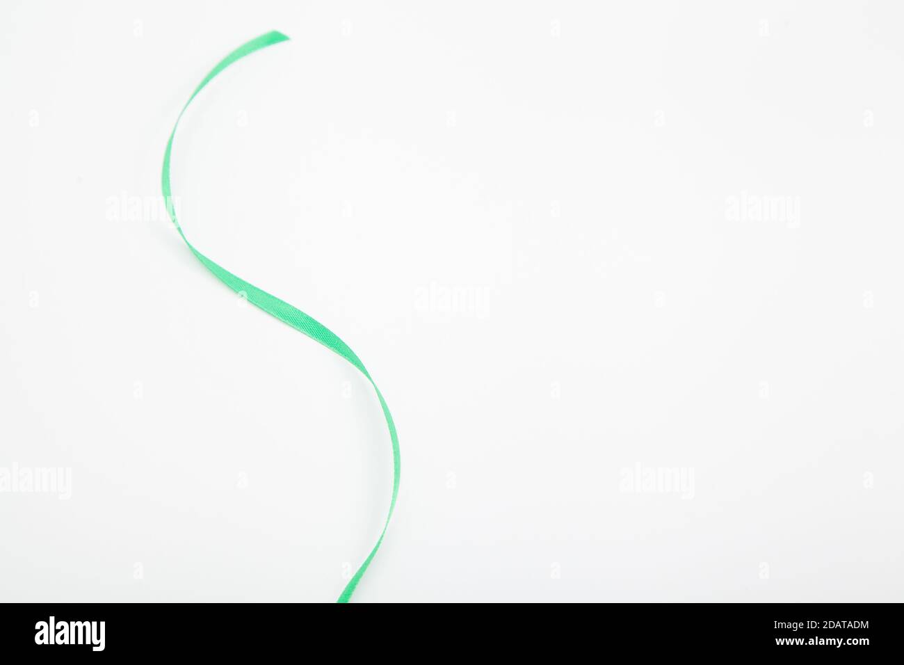 Wavy Ribbon Green Strip wavy white satin hi-res stock photography and images - Alamy