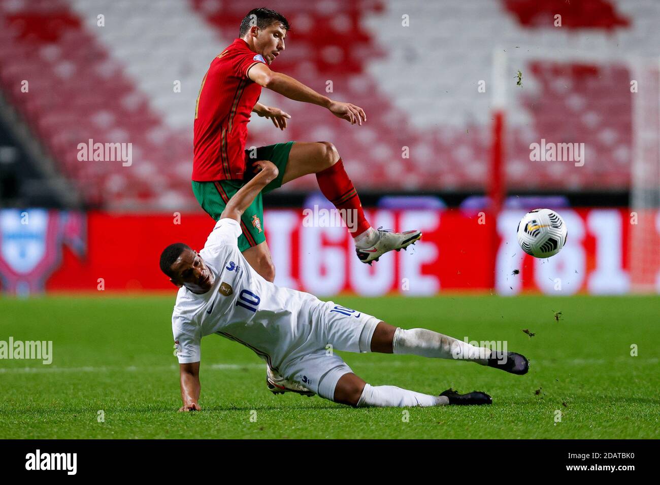 (201115) -- LISBON, Nov. 15, 2020 (Xinhua) -- Portugal's Ruben Dias (Top) vies with France's Anthony Martial during their UEFA Nations League football match in Lisbon, Portugal, Nov. 14, 2020. (Photo by Diogo Pinto/Xinhua) Stock Photo