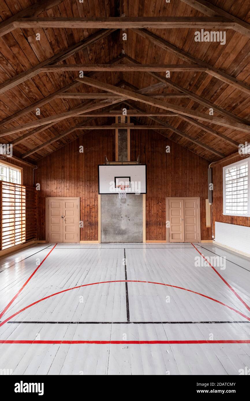 Interior of a retro basketball court in an old gymnasium Stock Photo