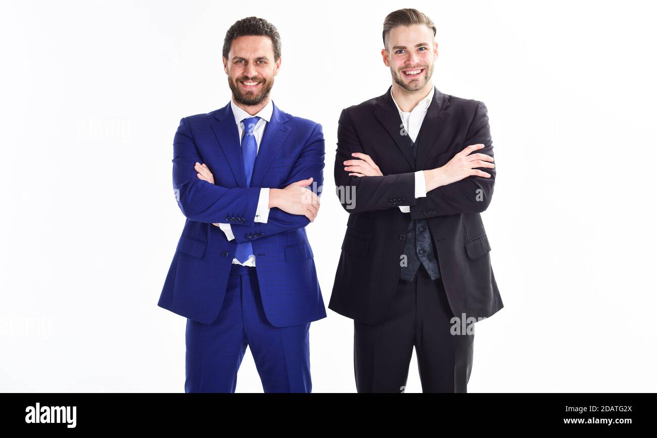 Men businessman formal suit stand confidently with crossed arms white background. Confident business bosses. Join business team. Trust and support. Build business team. Business leaders of department. Stock Photo