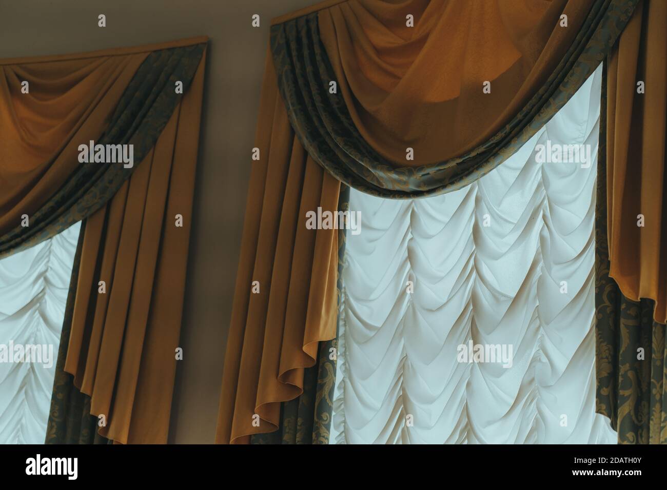 Close up of oldfashioned curtains on windows. Medieval curtains with