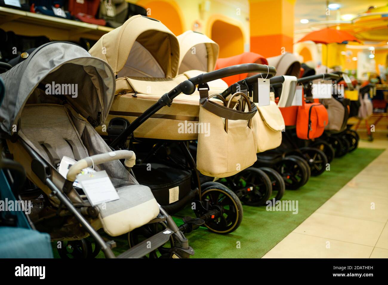 Row of baby strollers in children's store, nobody Stock Photo Alamy