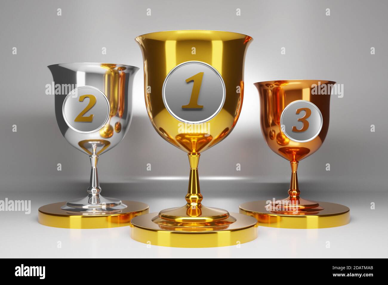 3d illustration of three gold, silver and bronze goblets on gray isolated  background. Sports competition awards concept. Award symbols Stock Photo -  Alamy