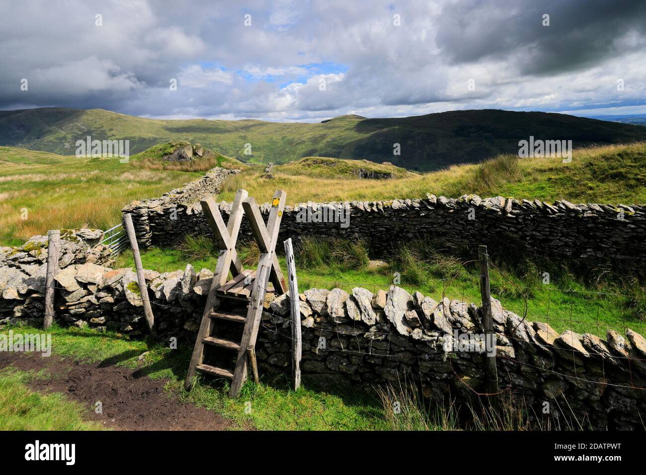 Footpath style on Wansfell fell, Troutbeck village, Kirkstone pass, Lake District National Park, Cumbria, England, UK Wansfell fell is one of the 214 Stock Photo