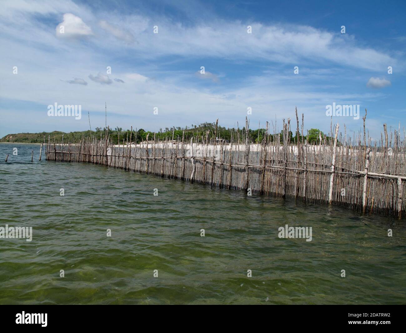 Fish trapping fences in a canal , Madagascar Stock Photo