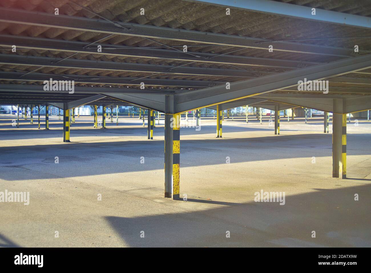 Roofed car parking ground inside industrial area Stock Photo Alamy