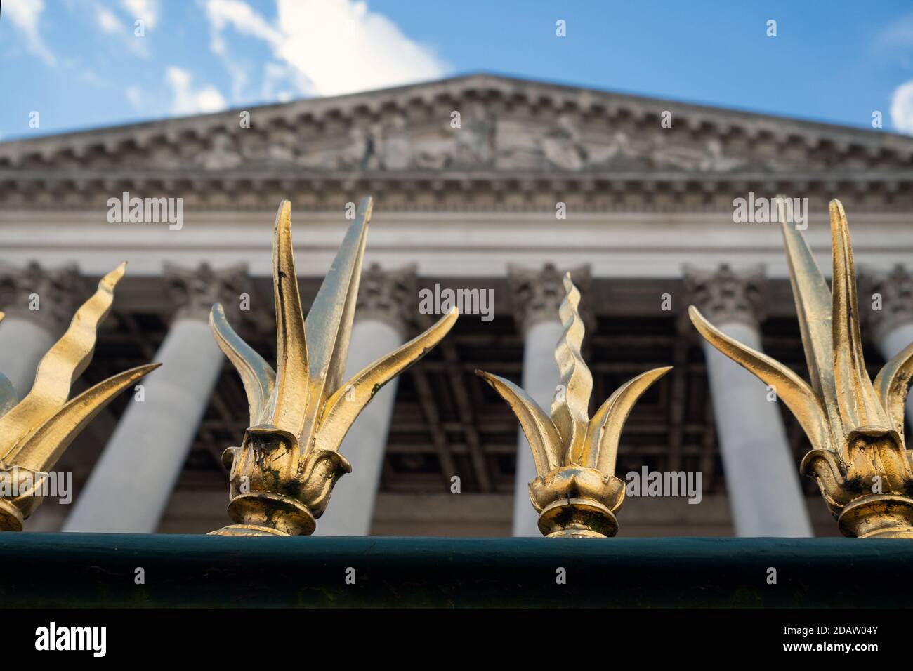 CAMBRIDGE, UK:  Gold railing ornaments and portico of the Fitzwilliam Museum with shallow depth of field Stock Photo