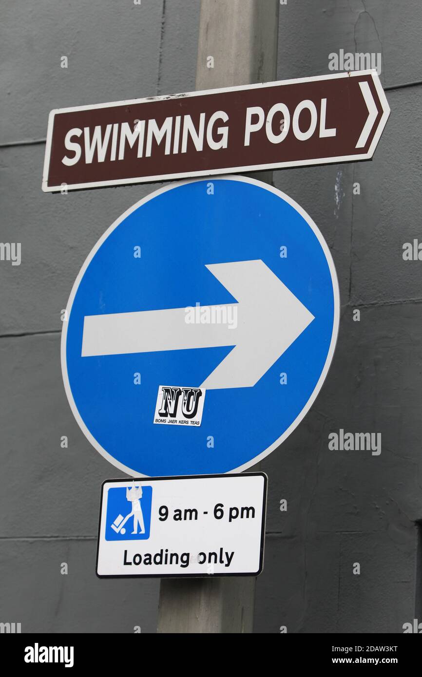A swimming pool direction sign in Brighton, East Sussex, UK Stock Photo