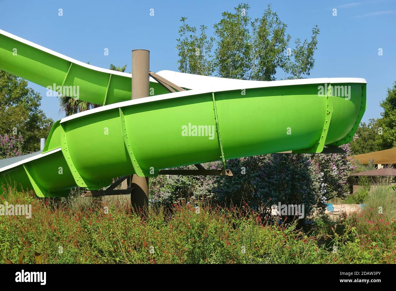 CEDAR CREEK, TX -17 SEP 2020- View of a water slide at the swimming pool at the Hyatt Regency Lost Pines Resort and Spa, a luxury vacation hotel near Stock Photo