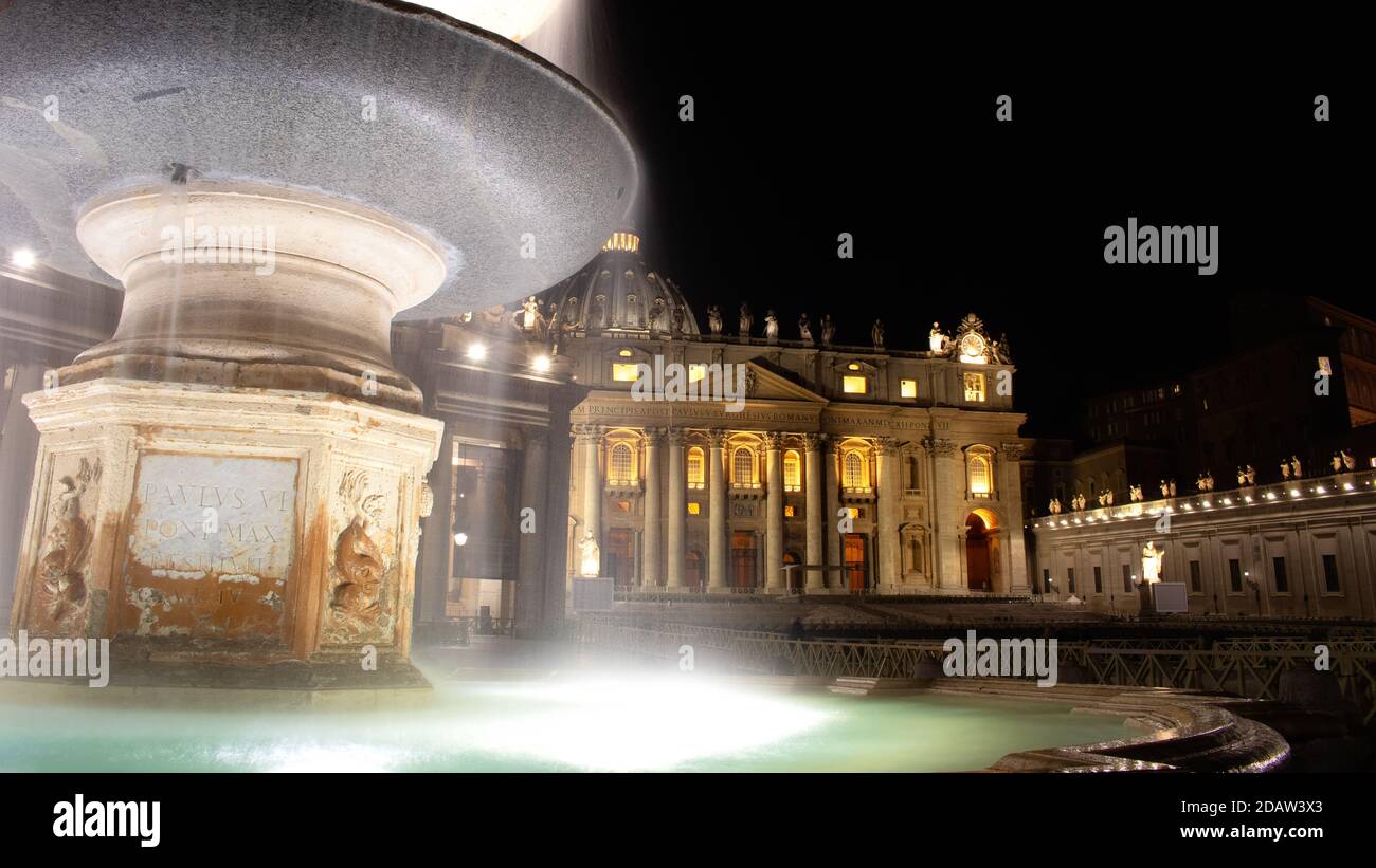 The Fontana del Bernini in St. Peter's Square in front of St. Peter's Basilica in Vatican City Stock Photo