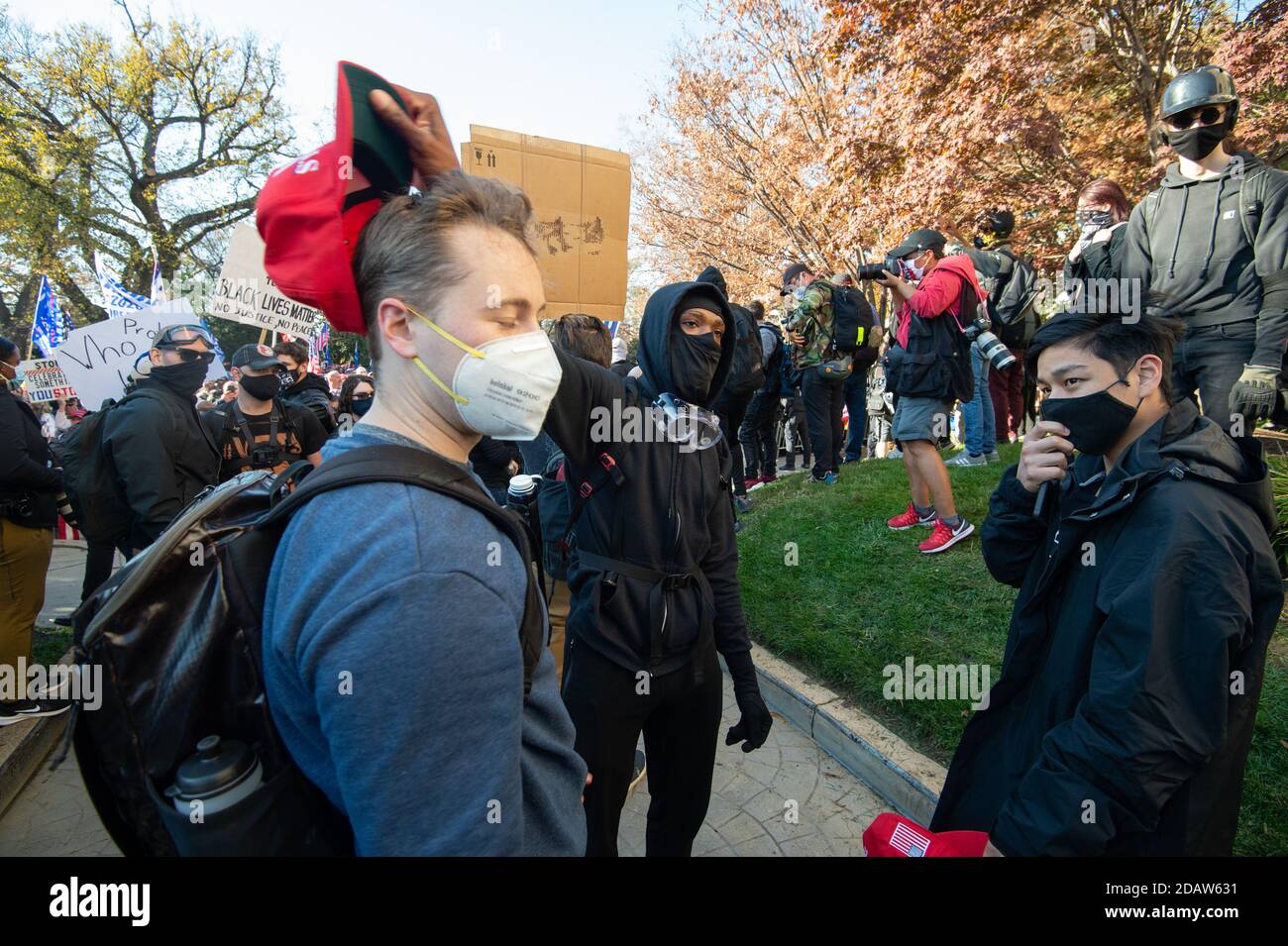 Washington DC, USA. 14th November, 2020. MAGA hat taken from President Trump supporters by Antifa in Washington DC at the Million Maga March to 'Stop the Steal' on November 14th, 2020. Credit: Albert Halim/Alamy Live News Stock Photo