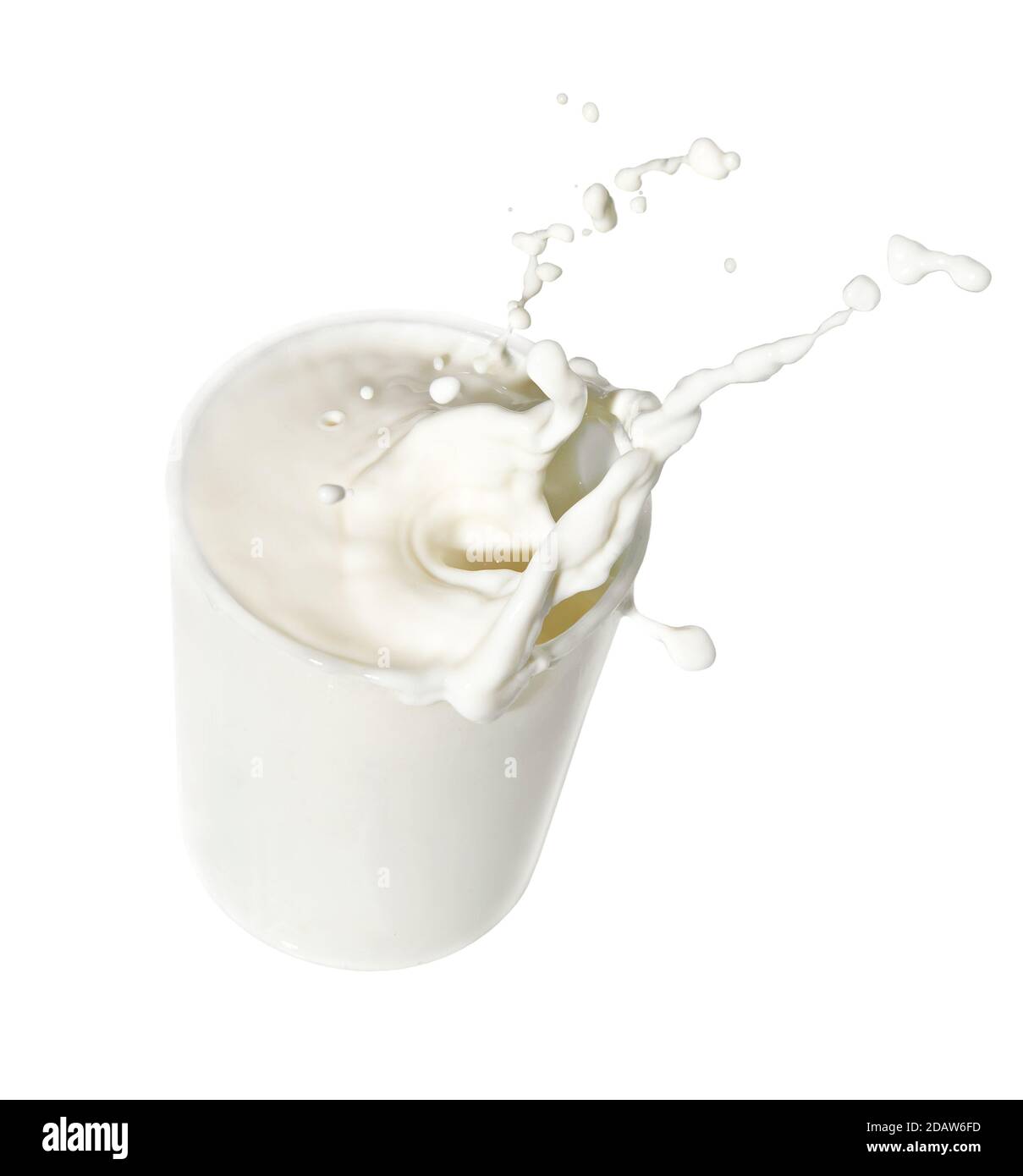 Milk in a clear glass beaker with splashes Stock Photo Alamy