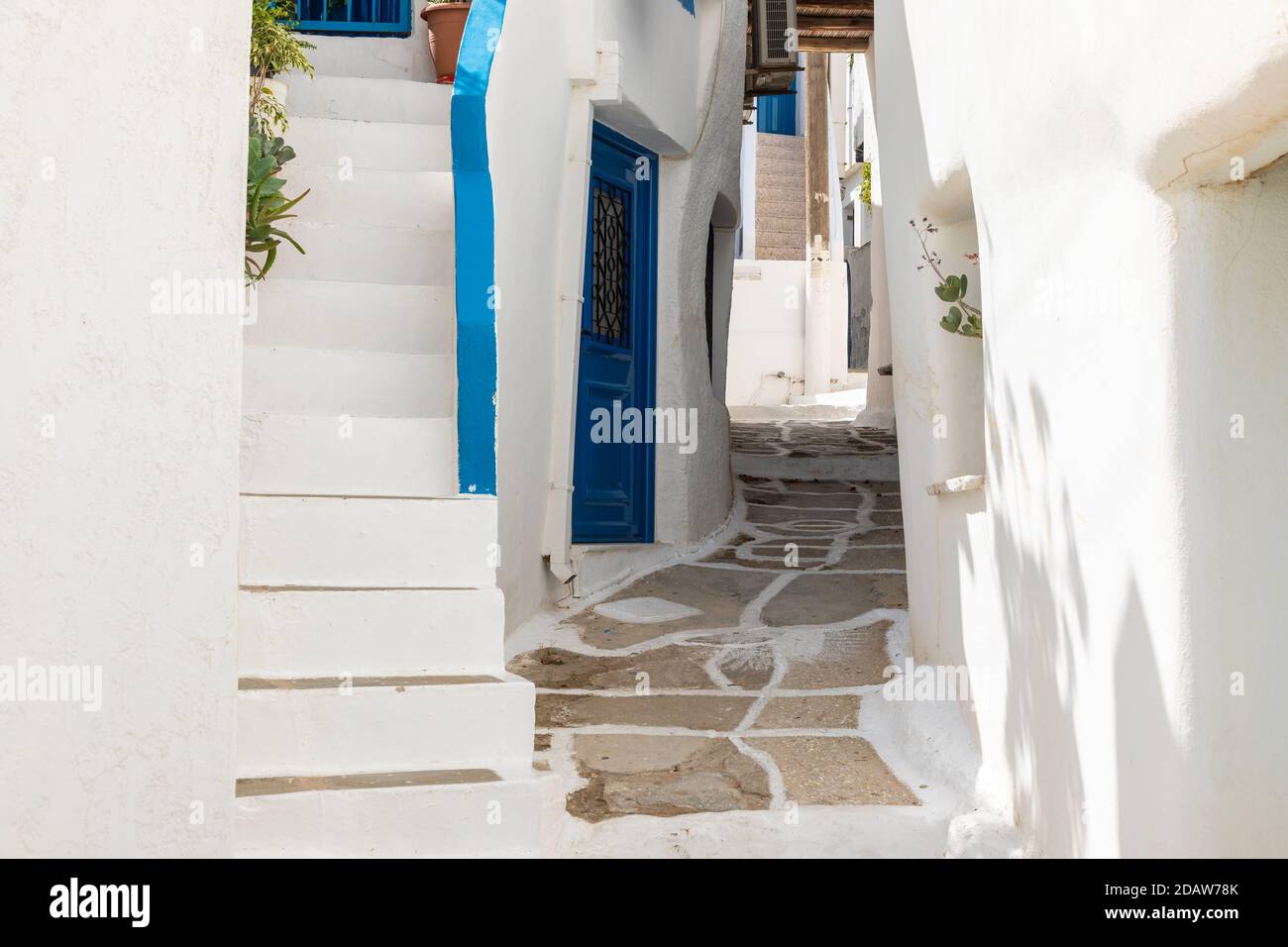 Chora, Ios Island, Greece- 20 September 2020: Narrow street of the old ...