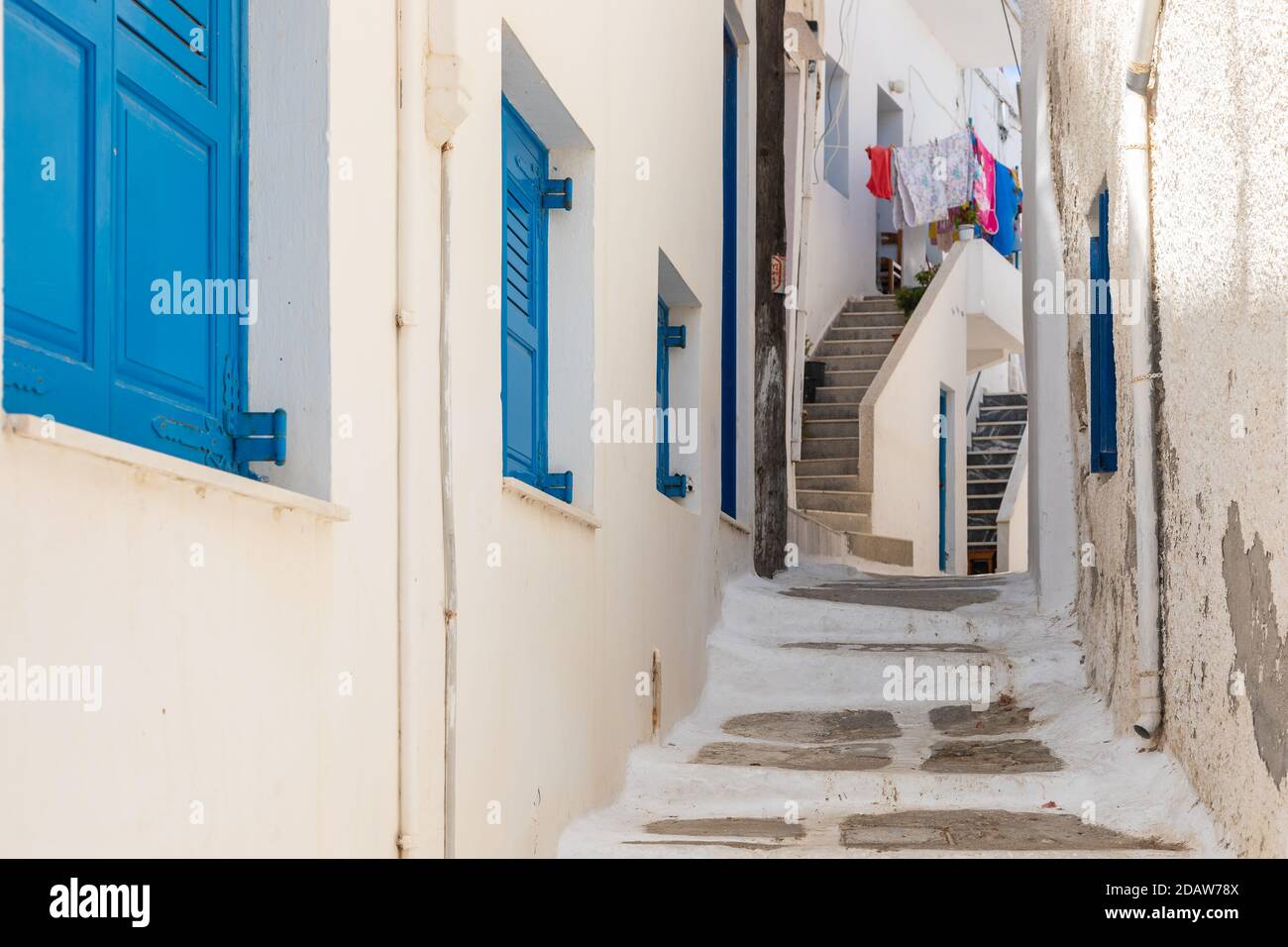 Chora, Ios Island, Greece- 20 September 2020: Narrow street of the old ...