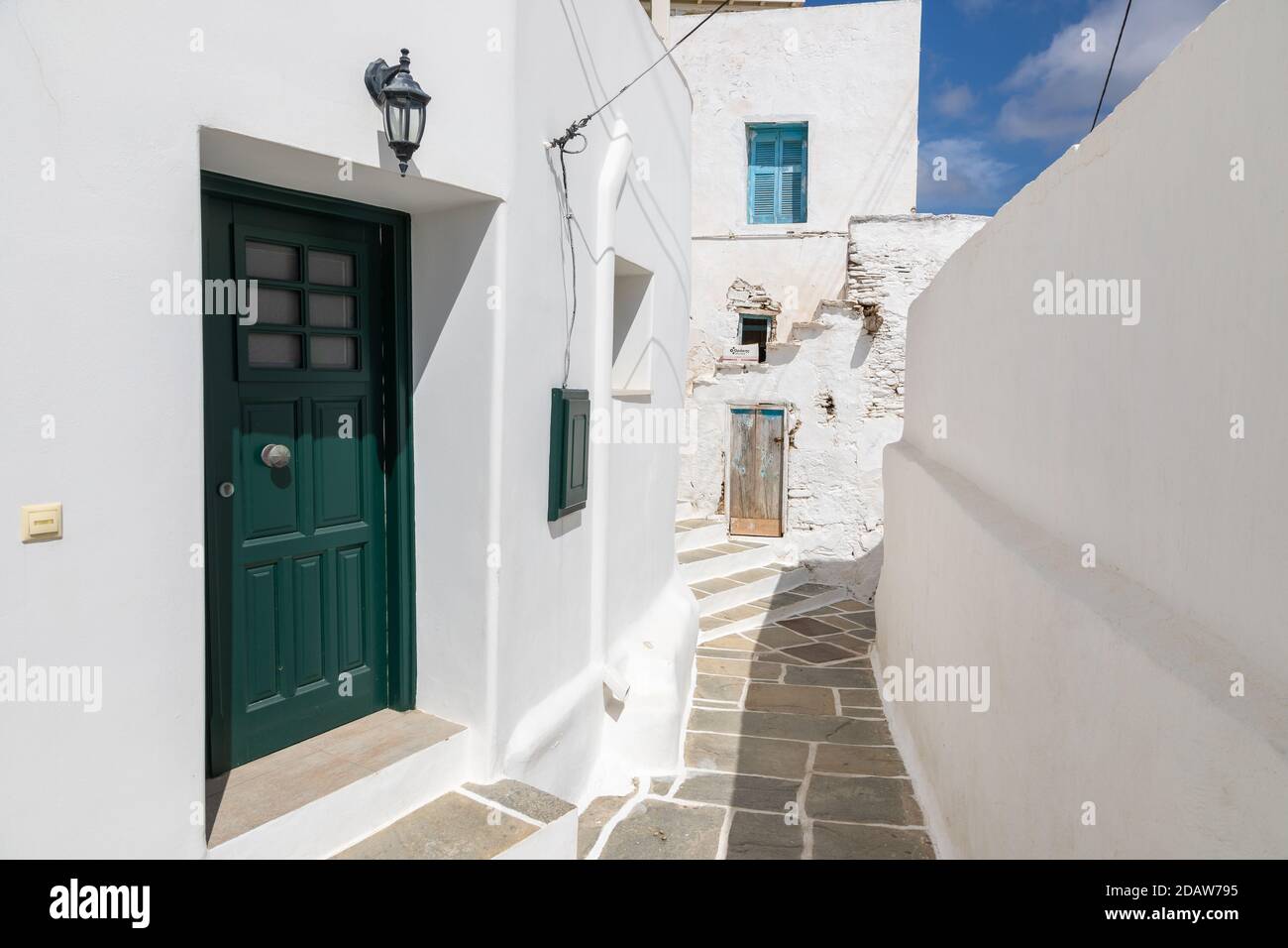 Chora, Ios Island, Greece- 20 September 2020: Narrow street of the old ...