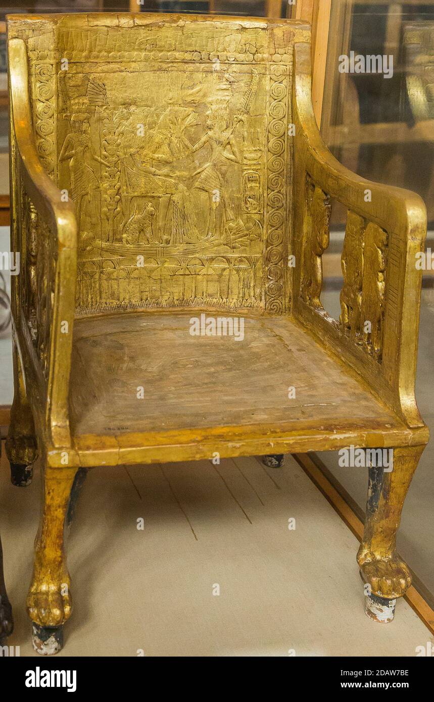 Egypt, Cairo, Egyptian Museum, from the tomb of Yuya and Thuya in Luxor : Wooden chair, plastered and gilded. The feet are lion paws. Stock Photo