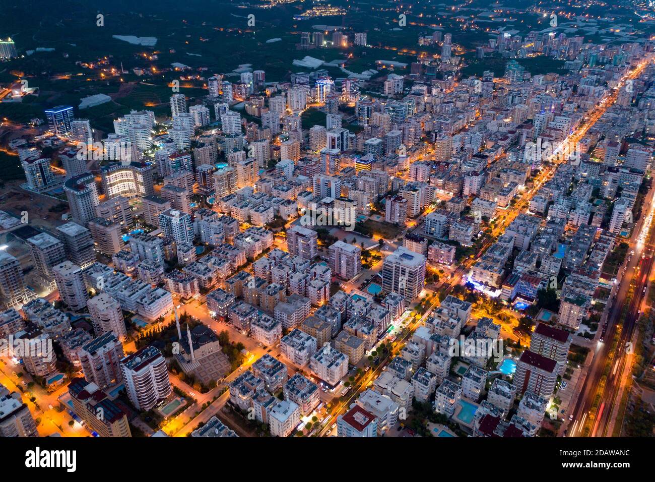 Evening agglomerated city life lightened by city traffic in Turkey Stock Photo