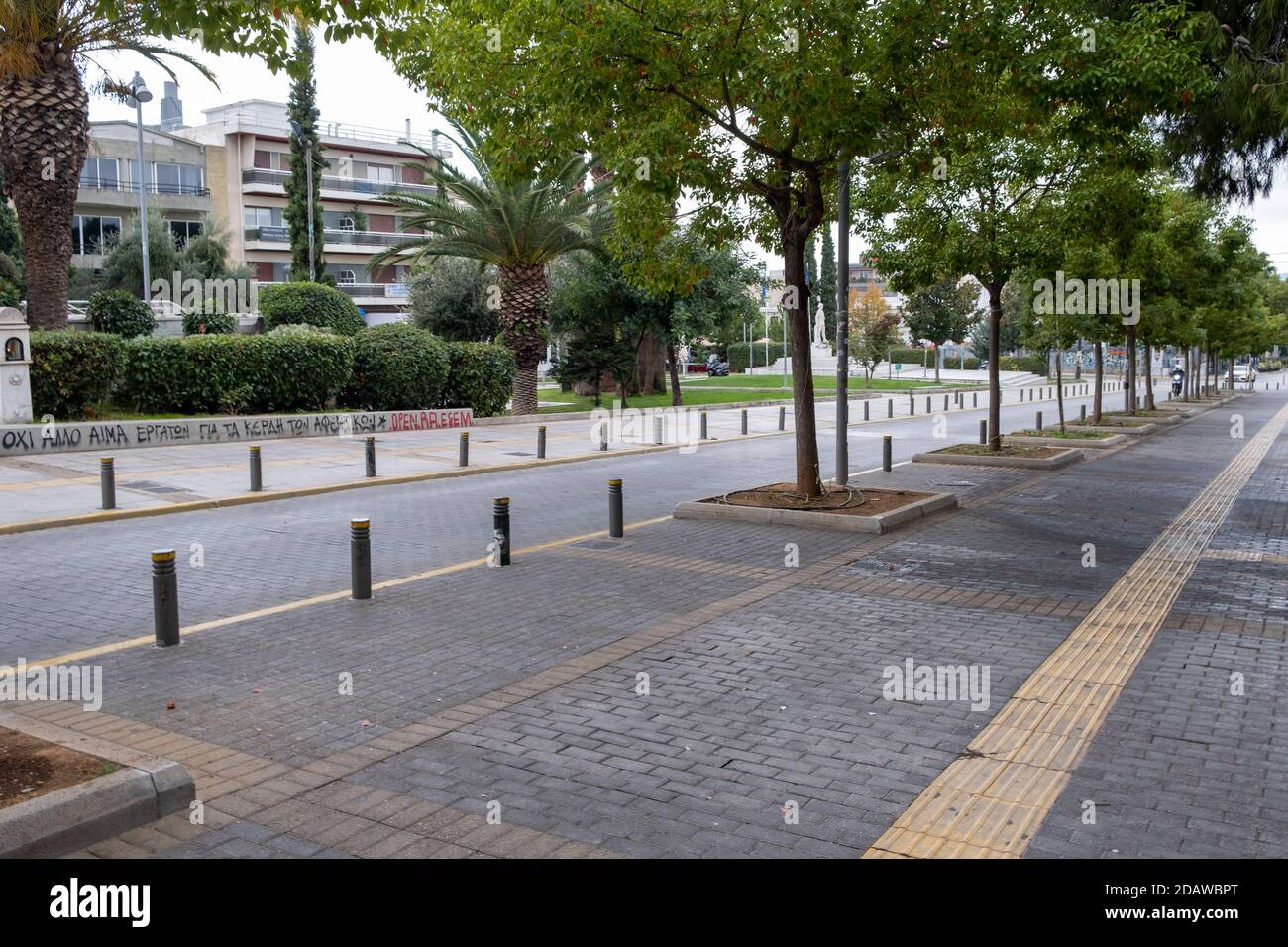 Athens, Greece. November 12, 2020. COVID19 coronavirus lockdown. Empty  street, no traffic, no pedestrians in Halandri city center, north Athens  suburb Stock Photo - Alamy