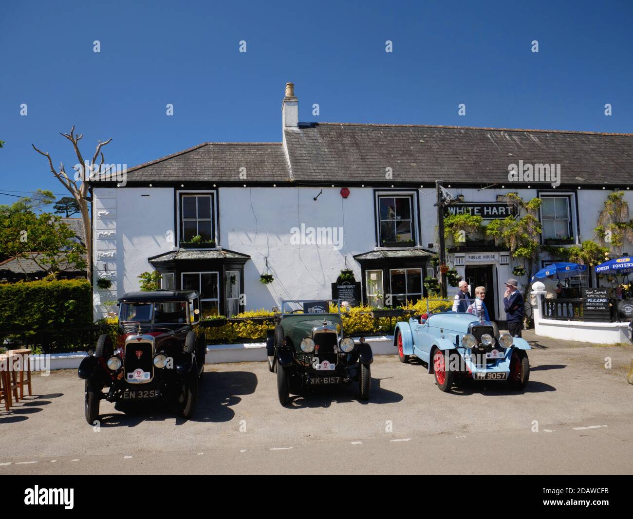Three vintage Alvis cars outside the White Hart at St Keverne, Cornwall in May 2019. Stock Photo