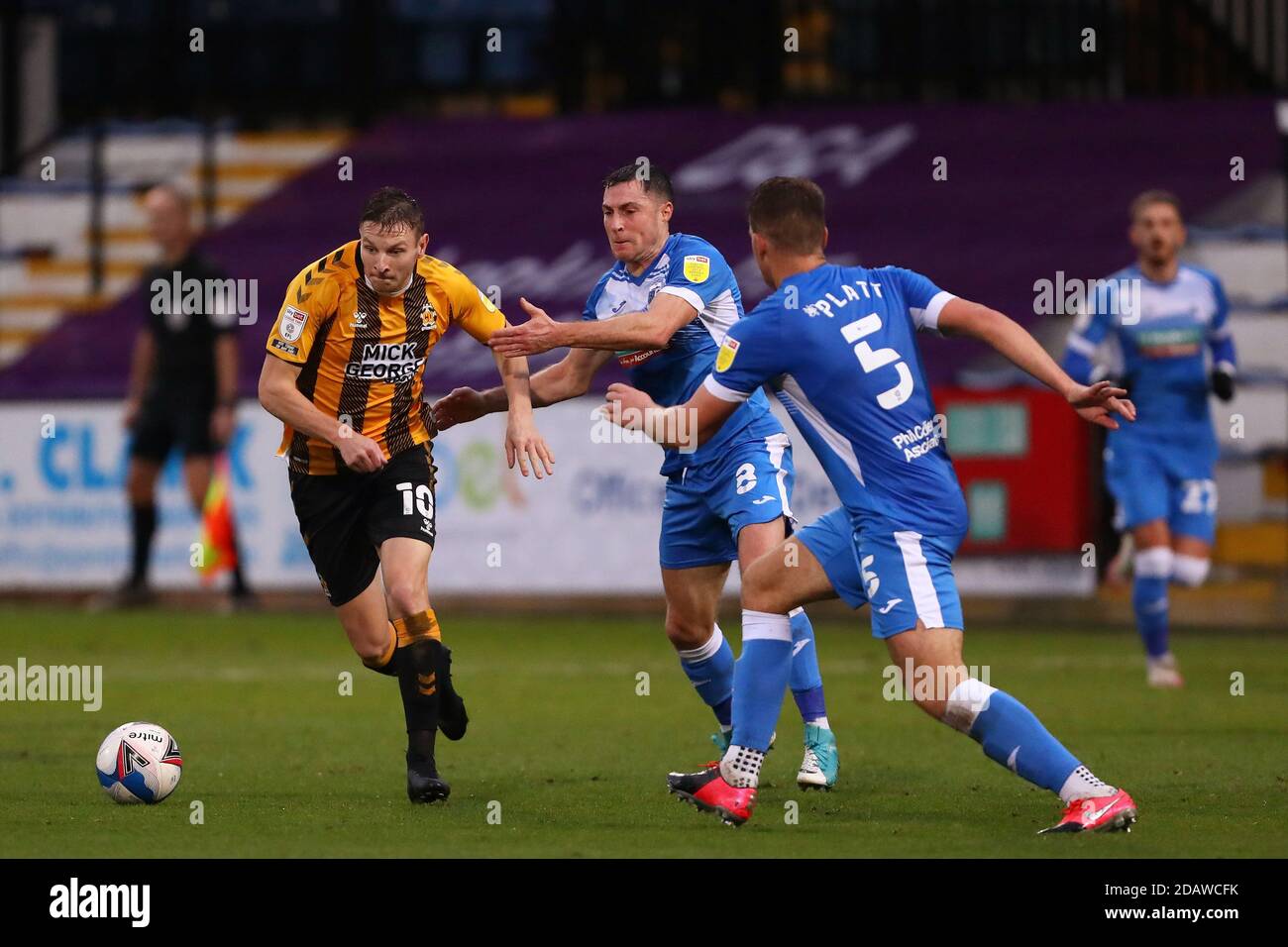 Paul Mullin of Cambridge United and Mike Jones of Barrow in action - Cambridge United v Barrow, Sky Bet League Two, Abbey Stadium, Cambridge, UK - 14th November 2020  Editorial Use Only - DataCo restrictions apply Stock Photo