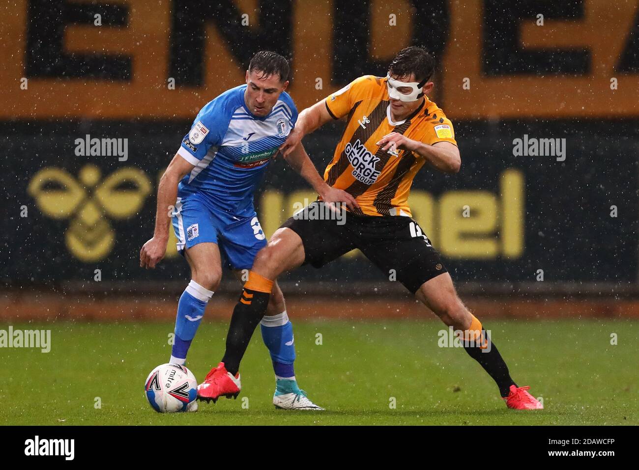 Paul Digby of Cambridge United and Mike Jones of Barrow - Cambridge United v Barrow, Sky Bet League Two, Abbey Stadium, Cambridge, UK - 14th November 2020  Editorial Use Only - DataCo restrictions apply Stock Photo