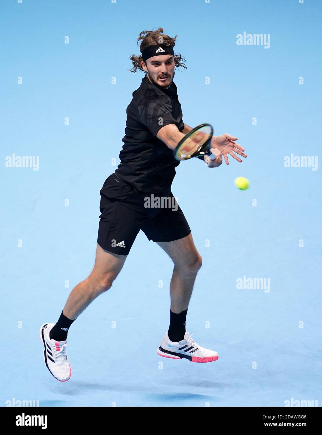 Stefanos Tsitsipas in action in his London 2020 group singles match during  day one of the Nitto ATP Finals at The O2 Arena, London Stock Photo - Alamy