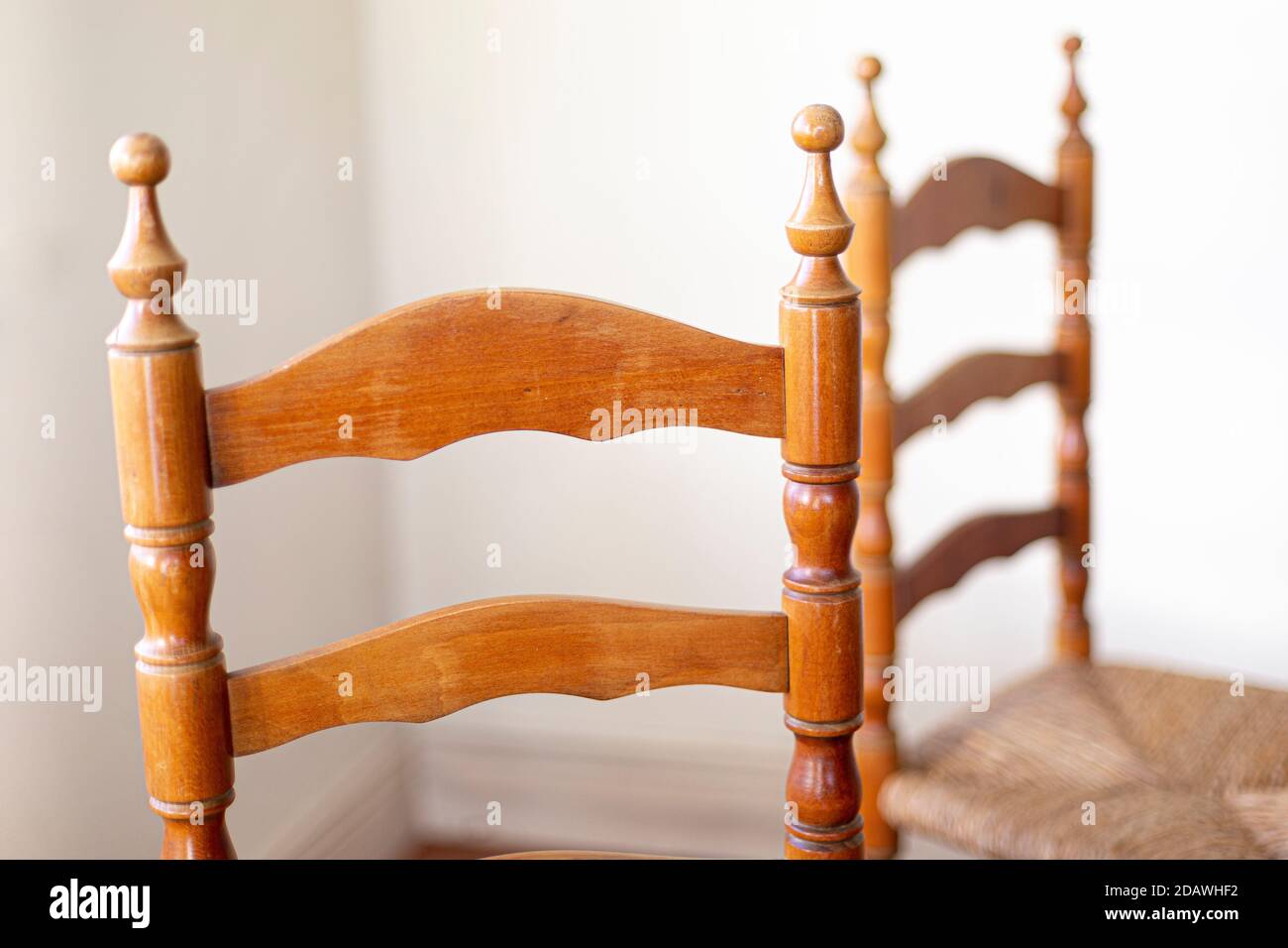 wooden and straw Súgán Irish chairs in kitchen Stock Photo