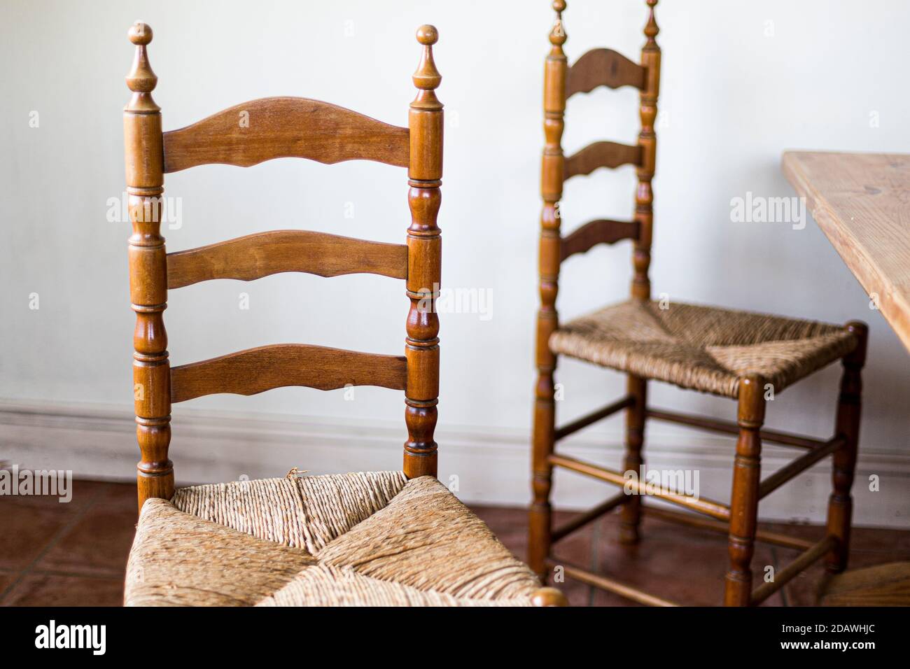wooden and straw Súgán Irish chairs in kitchen Stock Photo Alamy
