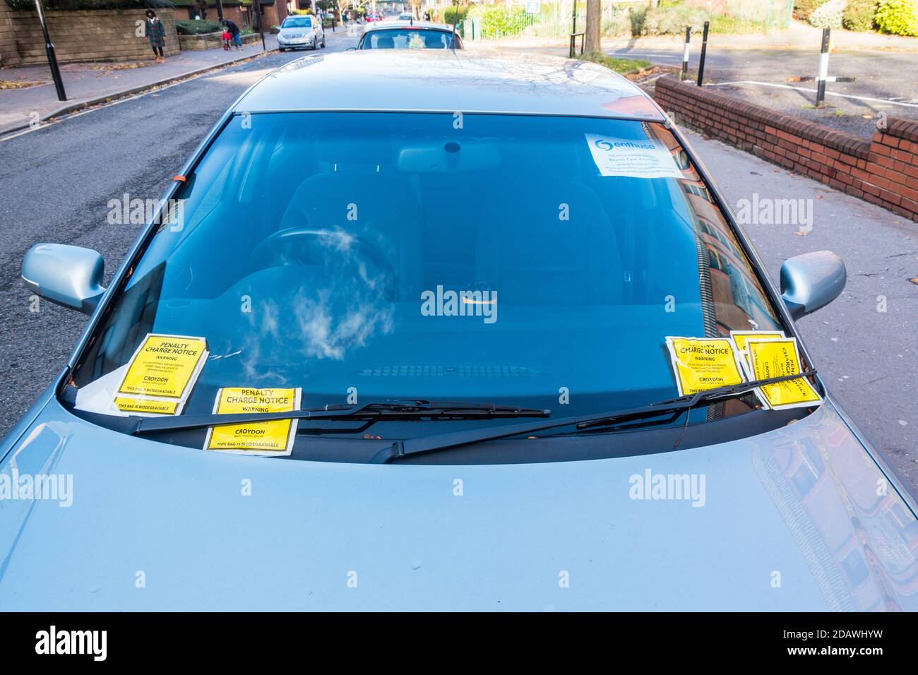 Parking fine notice Penalty charge notice on car windshield Stock Photo