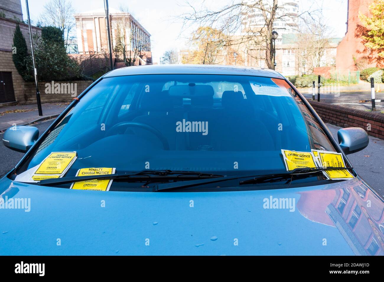 Multiple Penalty Charge Notice PCN stuck on a car front window Stock ...