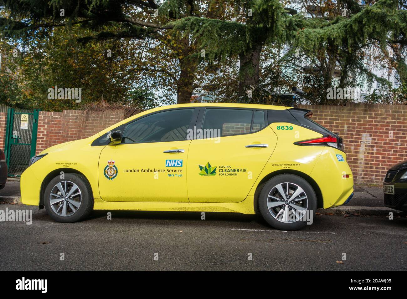 NHS London Ambulance with Clean Air Vehicle electric car Stock Photo