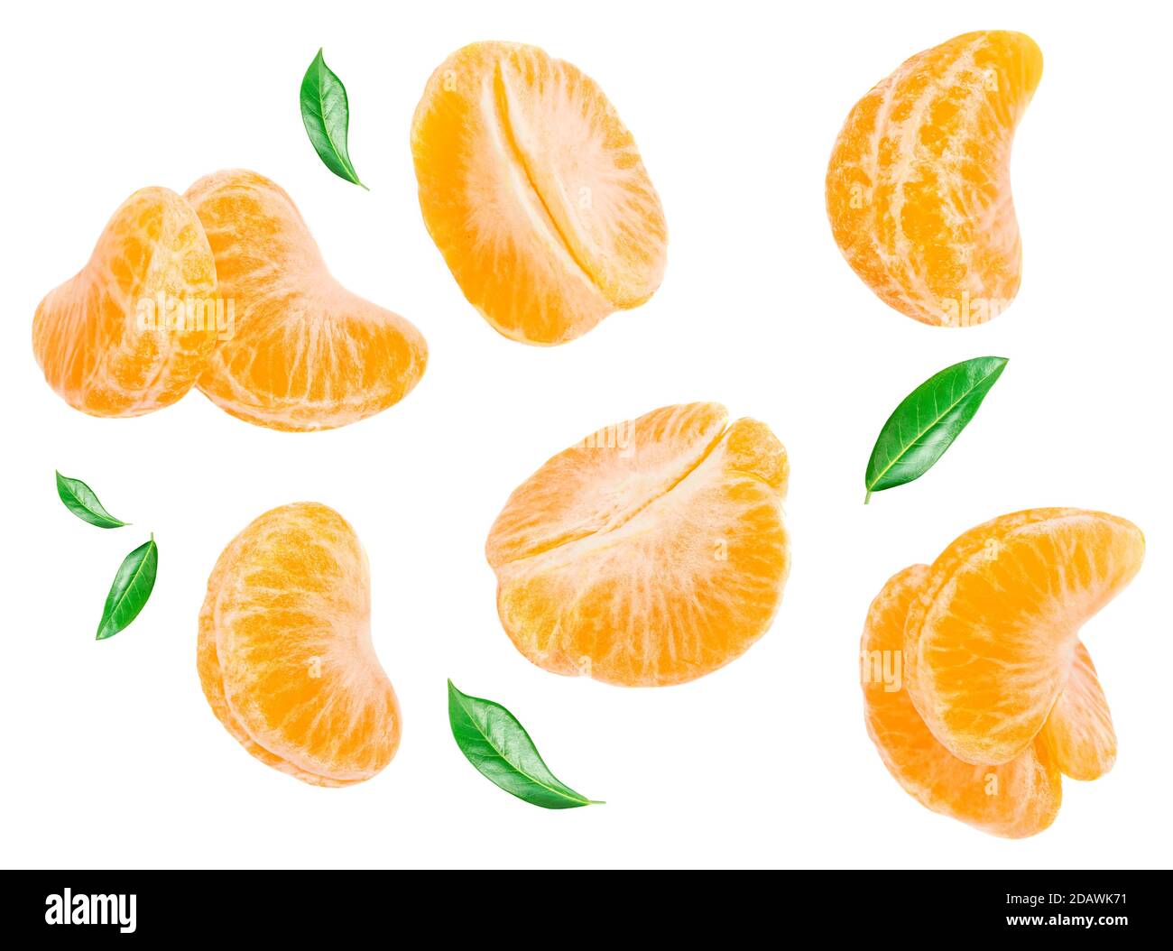 Fresh Mandarines, tangerine, clementine slices  with green citrus leaves isolated on white background. Pattern. Top view. Flat lay Stock Photo
