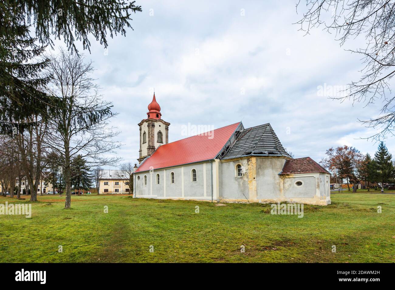 Nova Ves / Czech Republic - November 15 2020: View of the roman catholic church of the Most Holy Trinity built in the 18th century standing in a park. Stock Photo