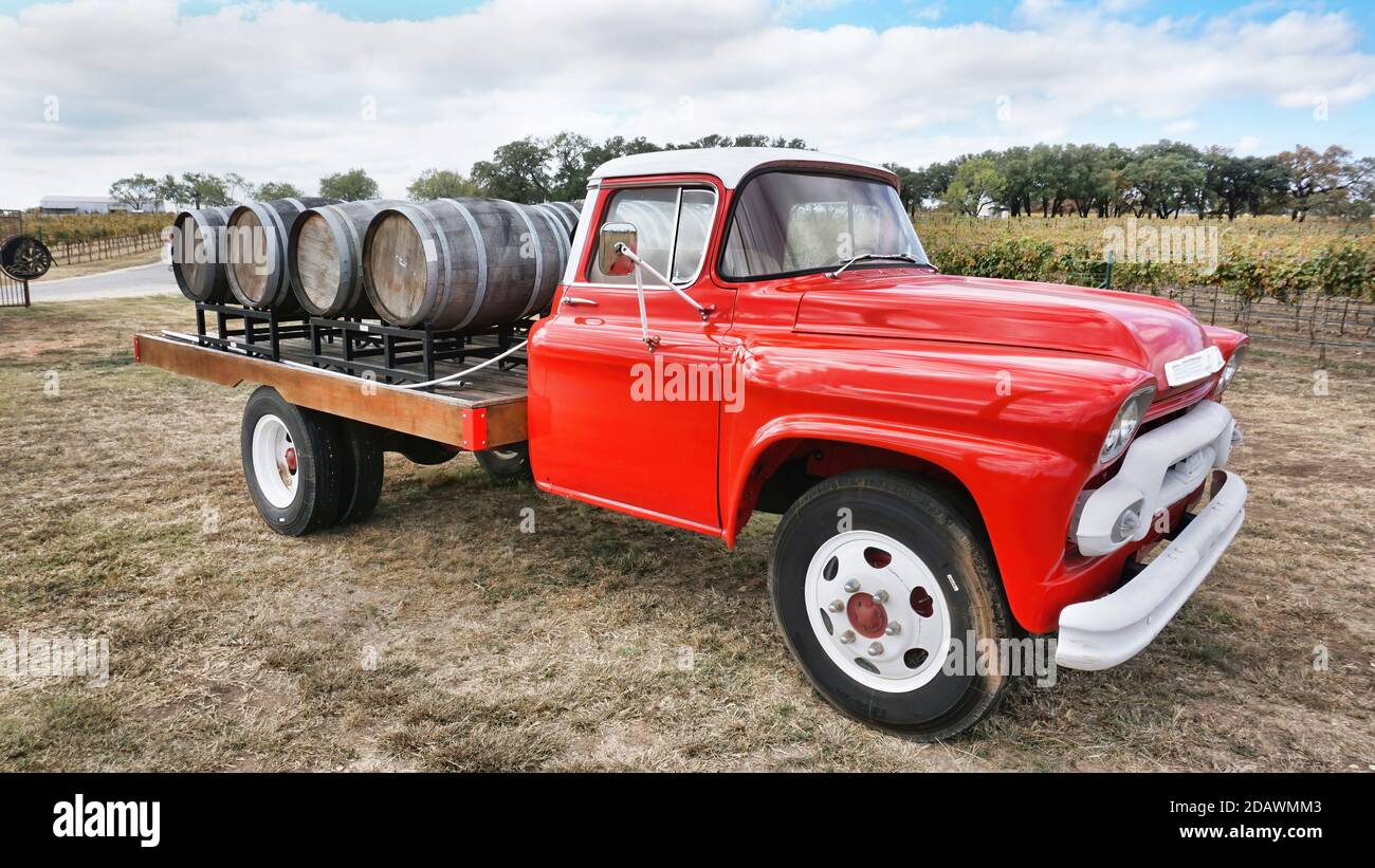 Fredericksburg,Texas- Nov.12-2020  Augusta Vin Winery in Texas Hill Country with 1950 GMC wine truck and vineyards in the background. Stock Photo