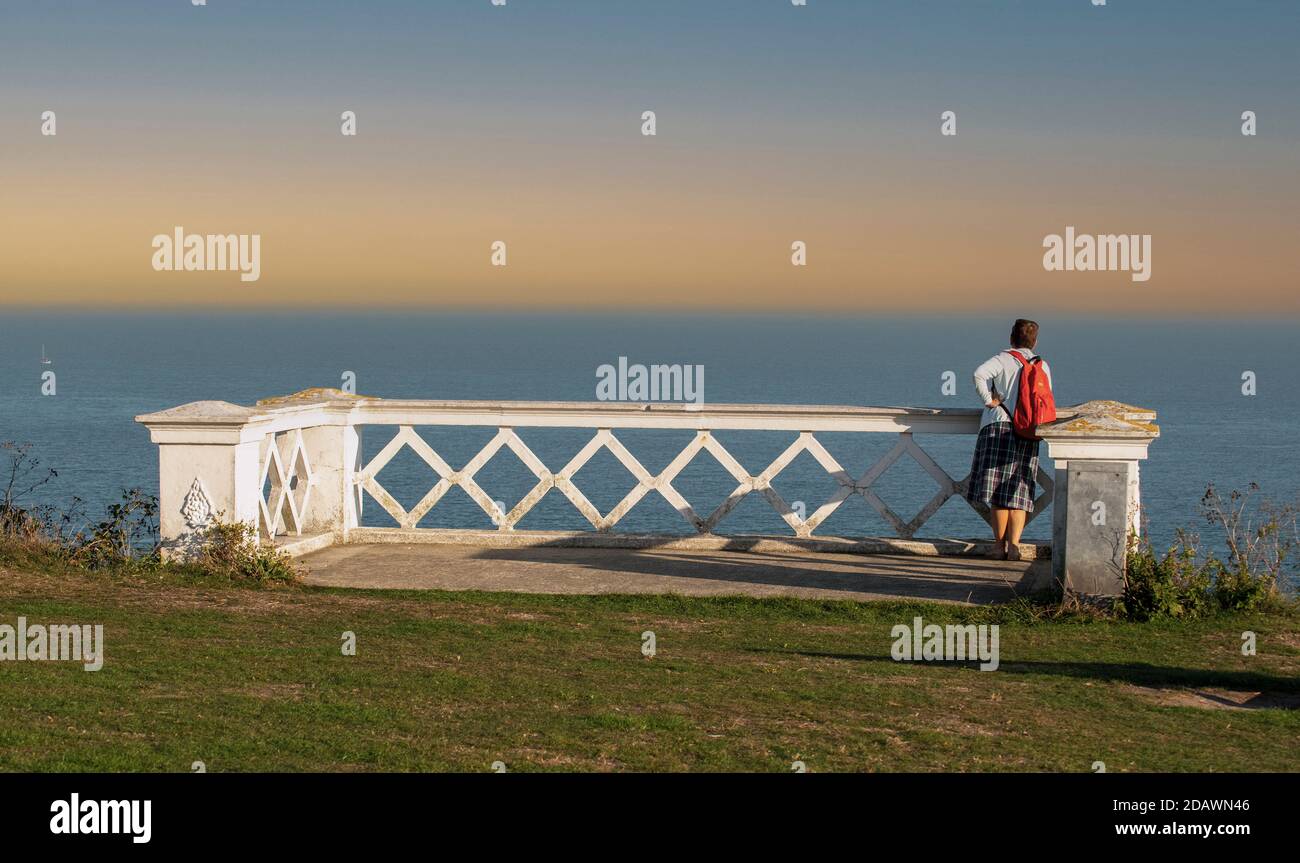 Folkestone, Kent, England, UK. 2020. Woman at a viewpoint overlooking the English Channel at Folkesstone, UK. Stock Photo