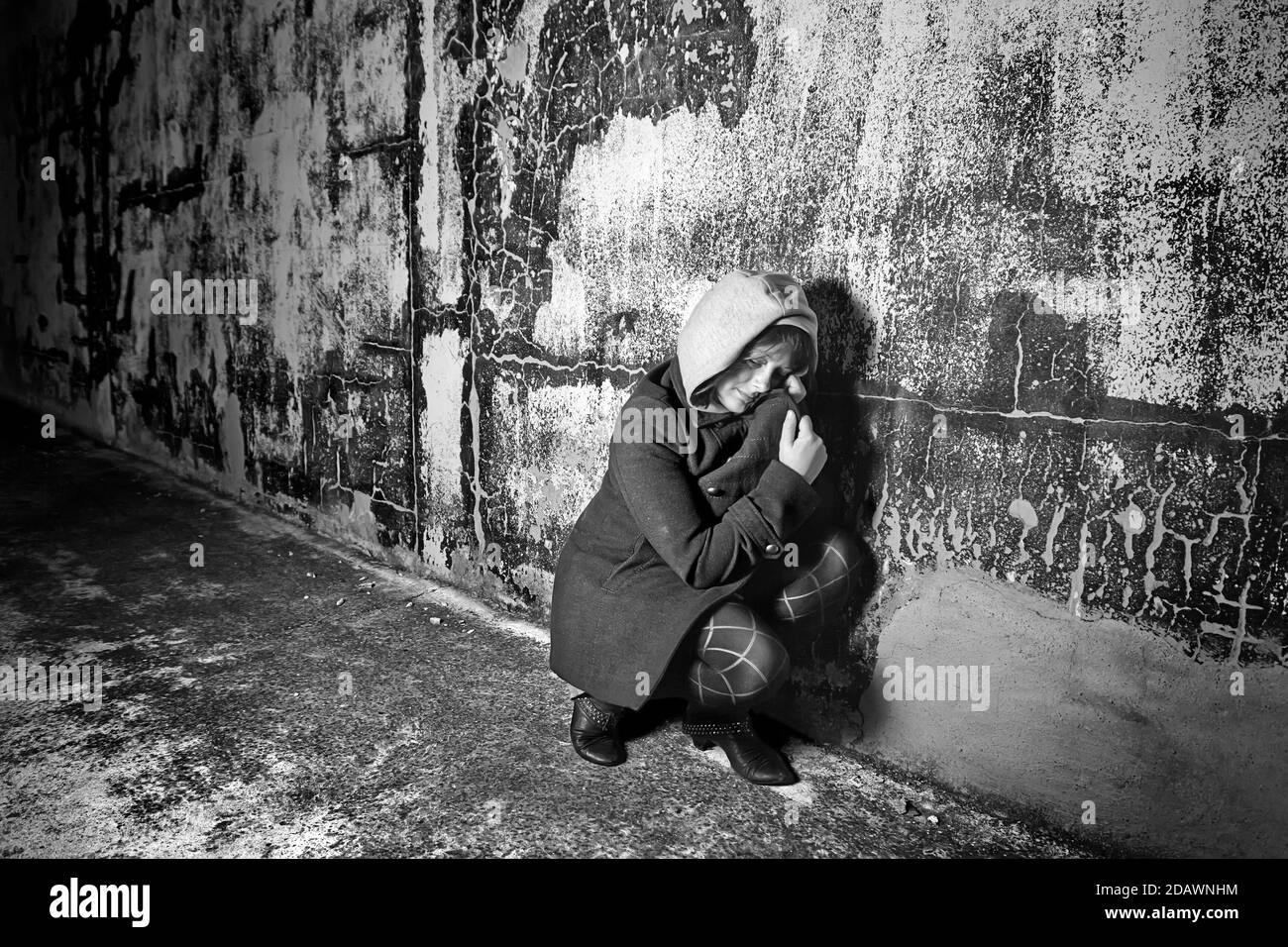 Scared woman  street, fear and loneliness, homeless Stock Photo