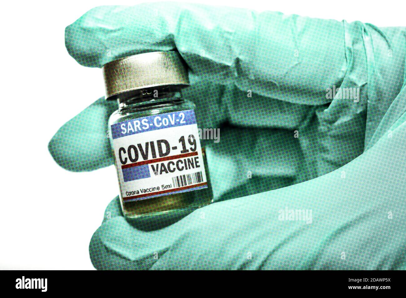 Hand holding corona vaccine vial Stock Photo