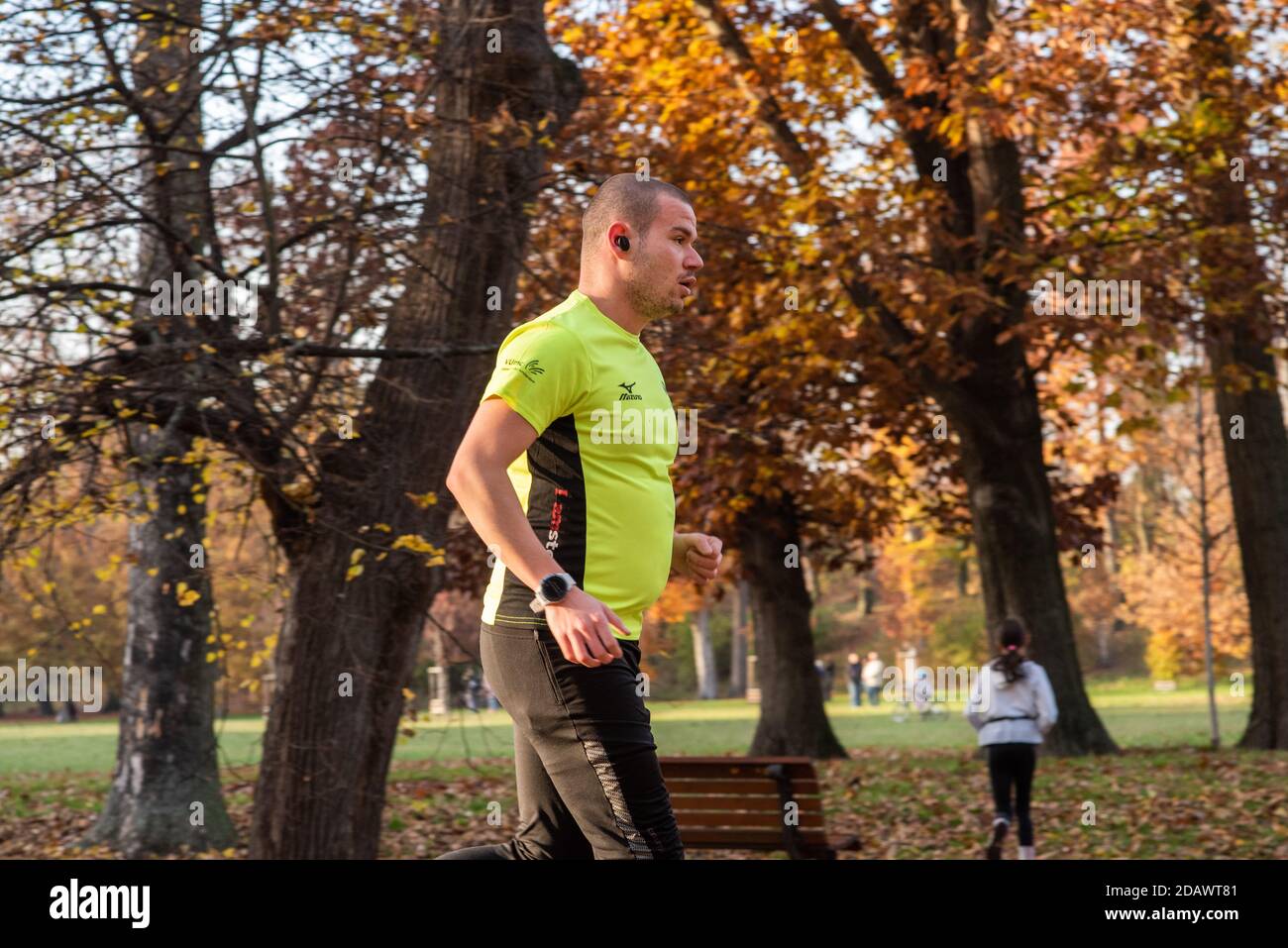 11/14/2020. Park Stromovka. Prague czech Republic. A man is running in the park on a Sunday winter day. Stock Photo