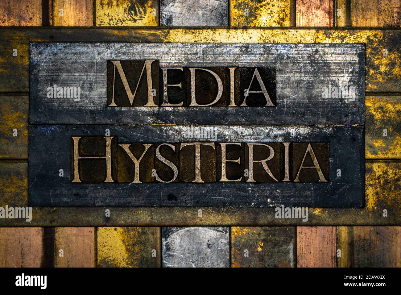 Media Hysteria text message on textured grunge copper and vintage gold background Stock Photo