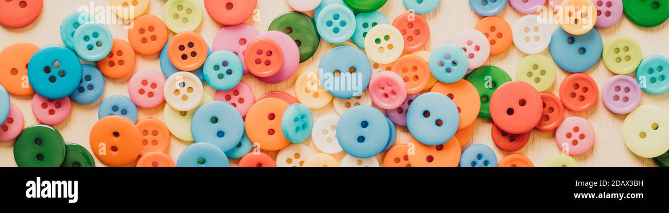 Multi-colored Plastic Buttons. Long Banner Stock Photo